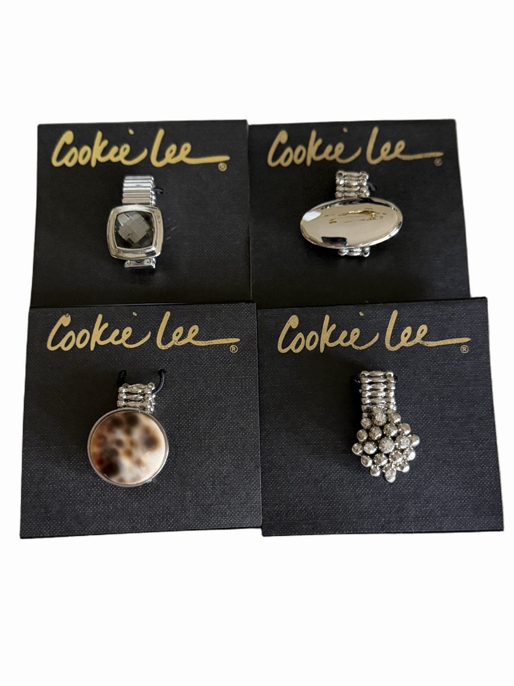 Cookie Lee Stretch Ring Bundle Set of 4 Silver Tone Statement Rings NWT